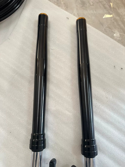 Kawasaki ZX-4RR right-hand fork damper assembly upright angle, compression adjuster and spring preload collar visible