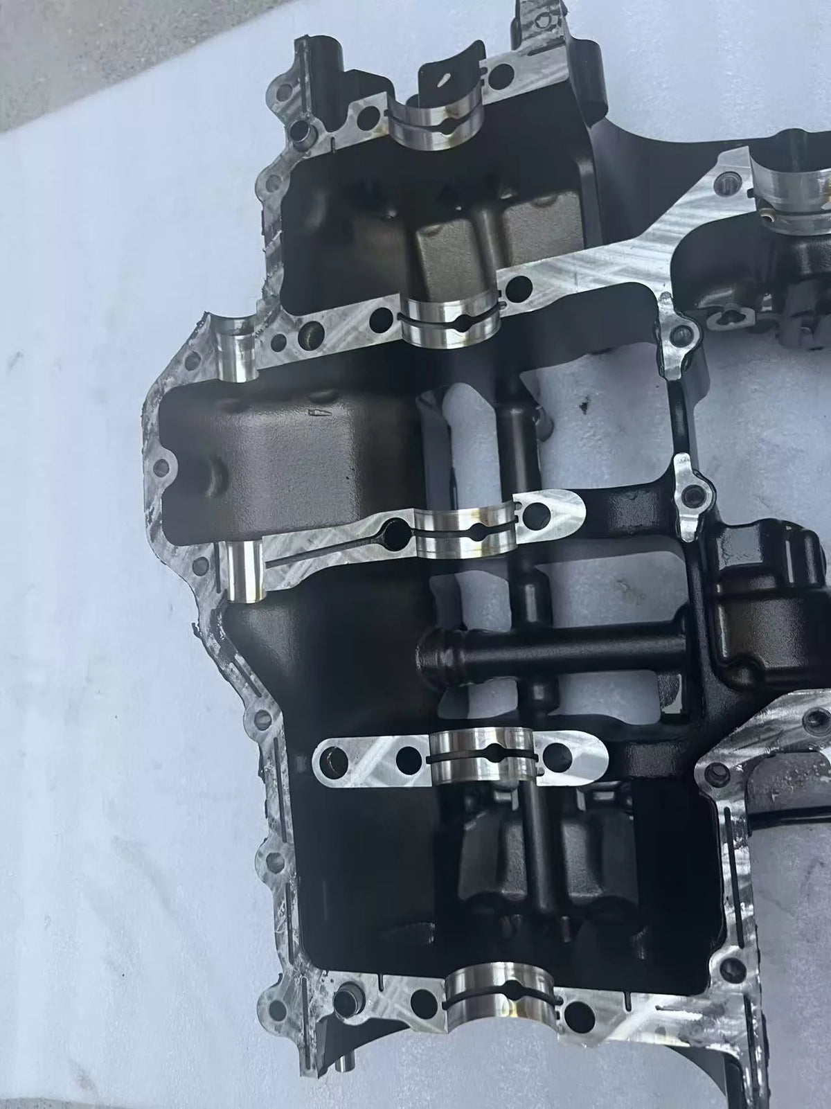 Lower crankcase Kawasaki Z900, opposite side view showing external ribbing and casting marks, used condition