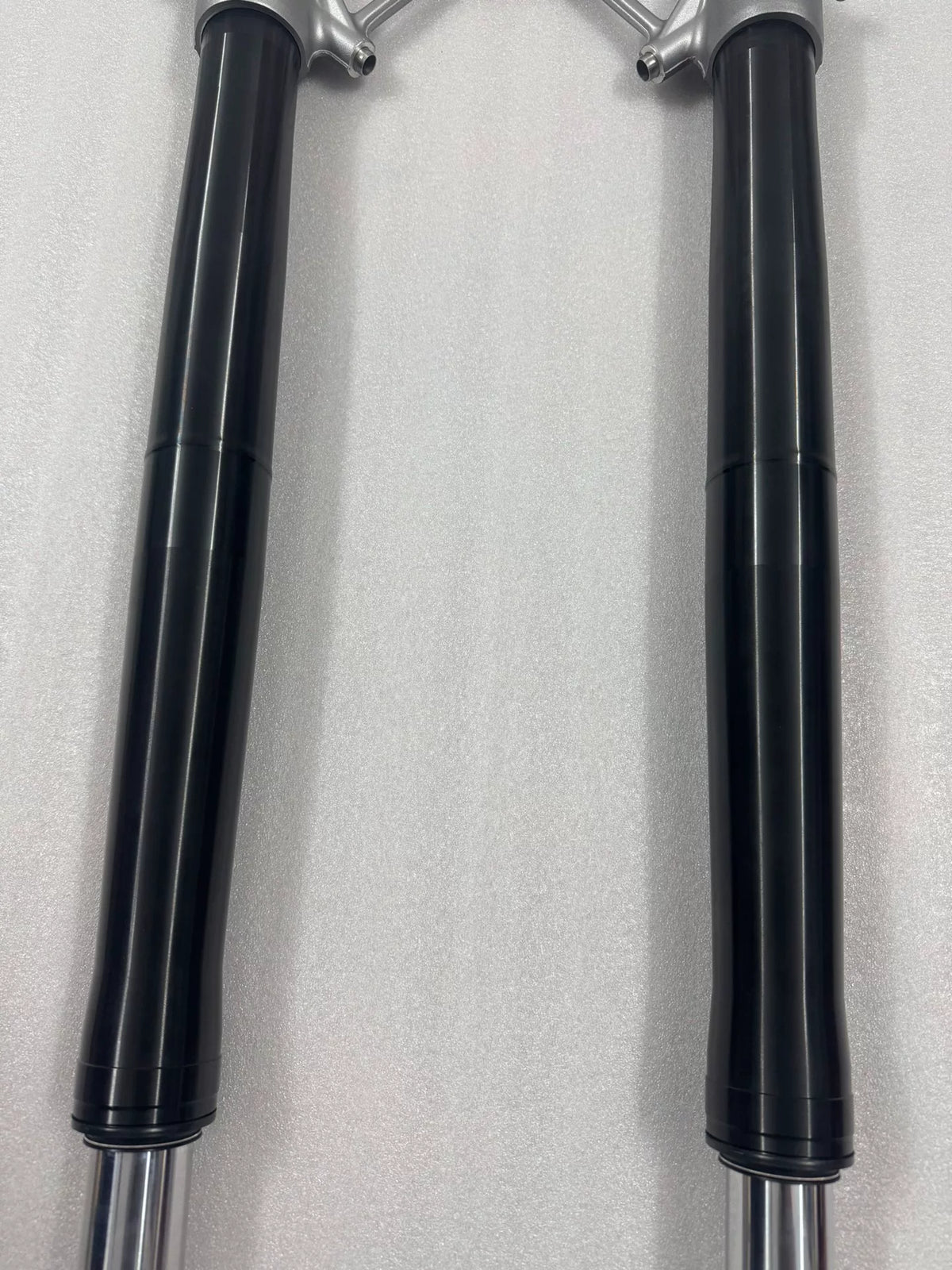 BMW R1200GS front fork rods, close-up of upper end threading and machined surface detail