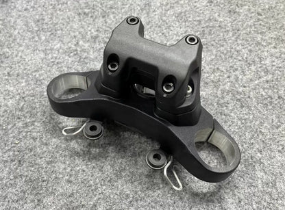 Ducati Monster 821 triple tree and handlebar bracket set, side profile showing stem height and hardware