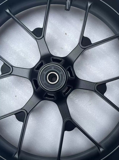 Honda CBR 500R front wheel rim straight, rear face view showing brake disc mounting holes