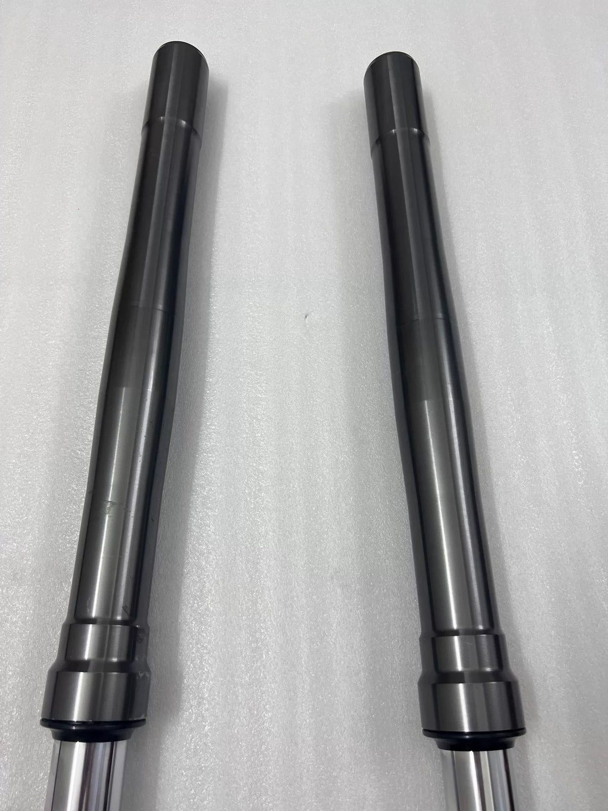 Kawasaki Ninja 1000 SX front fork top cap and preload adjuster close-up, anodized finish detail