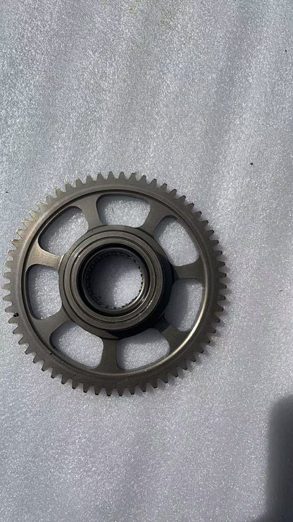 BMW G310R flywheel angled view showing overall shape and rotor construction