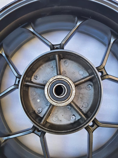 Honda CBR650R rear wheel, close-up of hub center and axle area detail