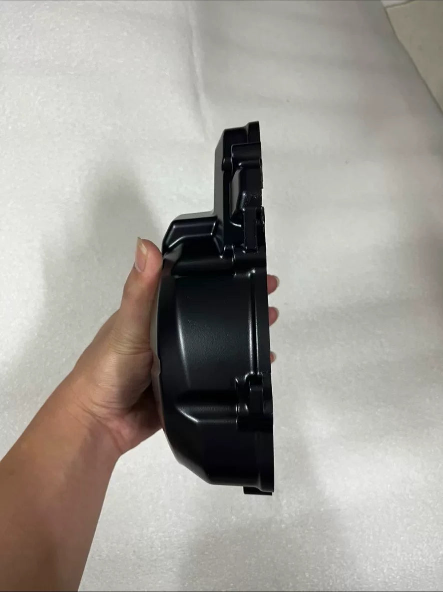 Kawasaki Z900 stator cover, rear view showing inner surface and bolt hole pattern
