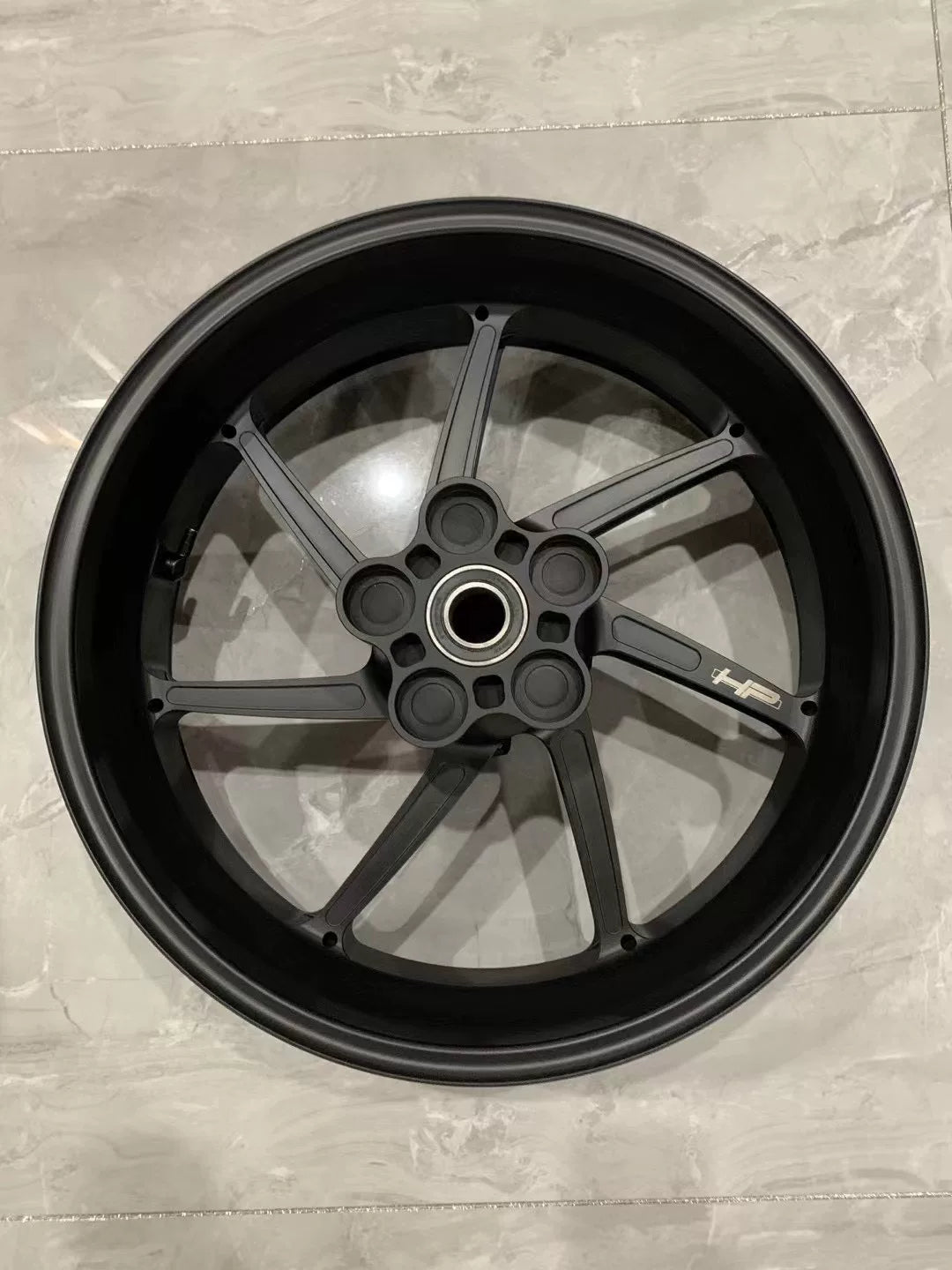 BMW S1000RR M Package HP front rim, full wheel face-on view showing forged spoke structure