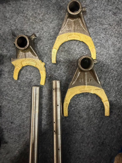 BMW S1000RR gearbox close-up of selector forks and gear dogs condition