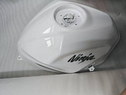 Kawasaki Ninja 400 white fuel tank three-quarter view showing overall shape and white paint finish