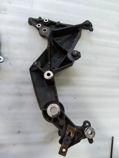 Ducati Multistrada 1200 footpeg bracket, side profile view showing bracket curvature and finish