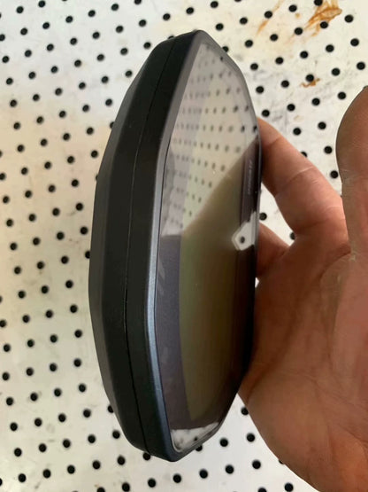 Side profile of Ducati Monster 797 instrument cluster, slim black housing and curved display glass