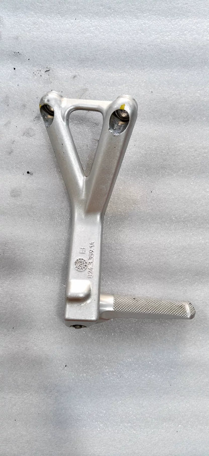 Panigale V4 rear sets bracket side profile view showing step adjustment positions and linkage mounting points