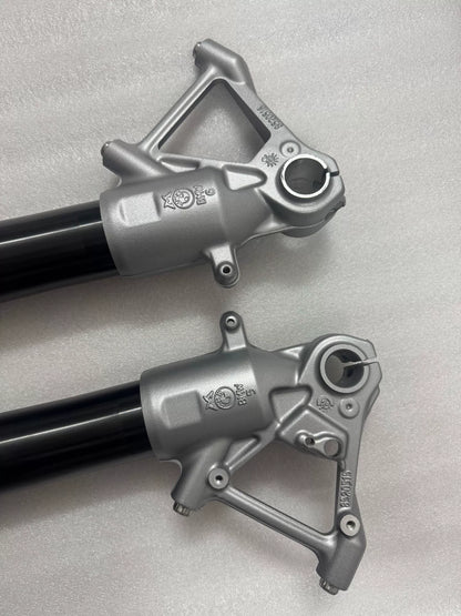 BMW R1200GS fork rod, close-up of lower end tip detail, precision machined finish visible