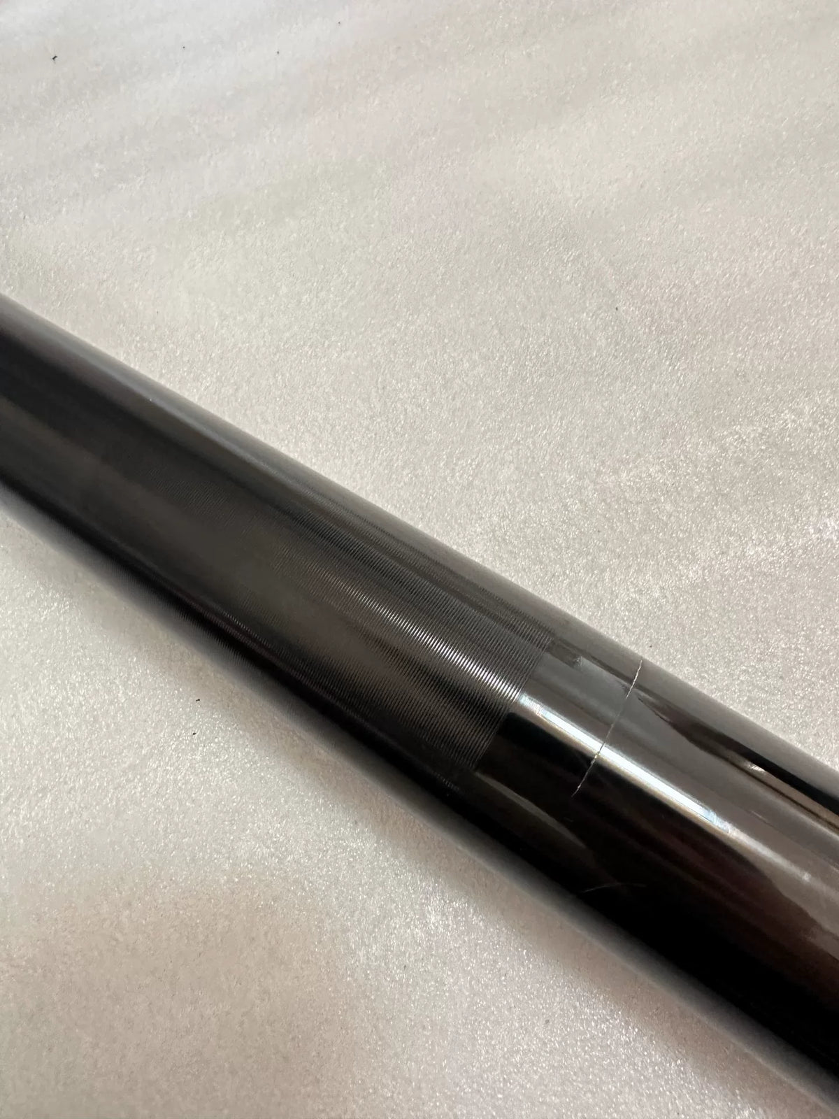 Kawasaki ZX-4RR fork damper RH side view displaying lower leg casting and axle clamp area