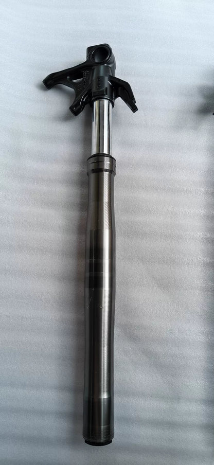 Ducati Panigale V2 front fork pair, rear view showing rebound adjuster and preload settings