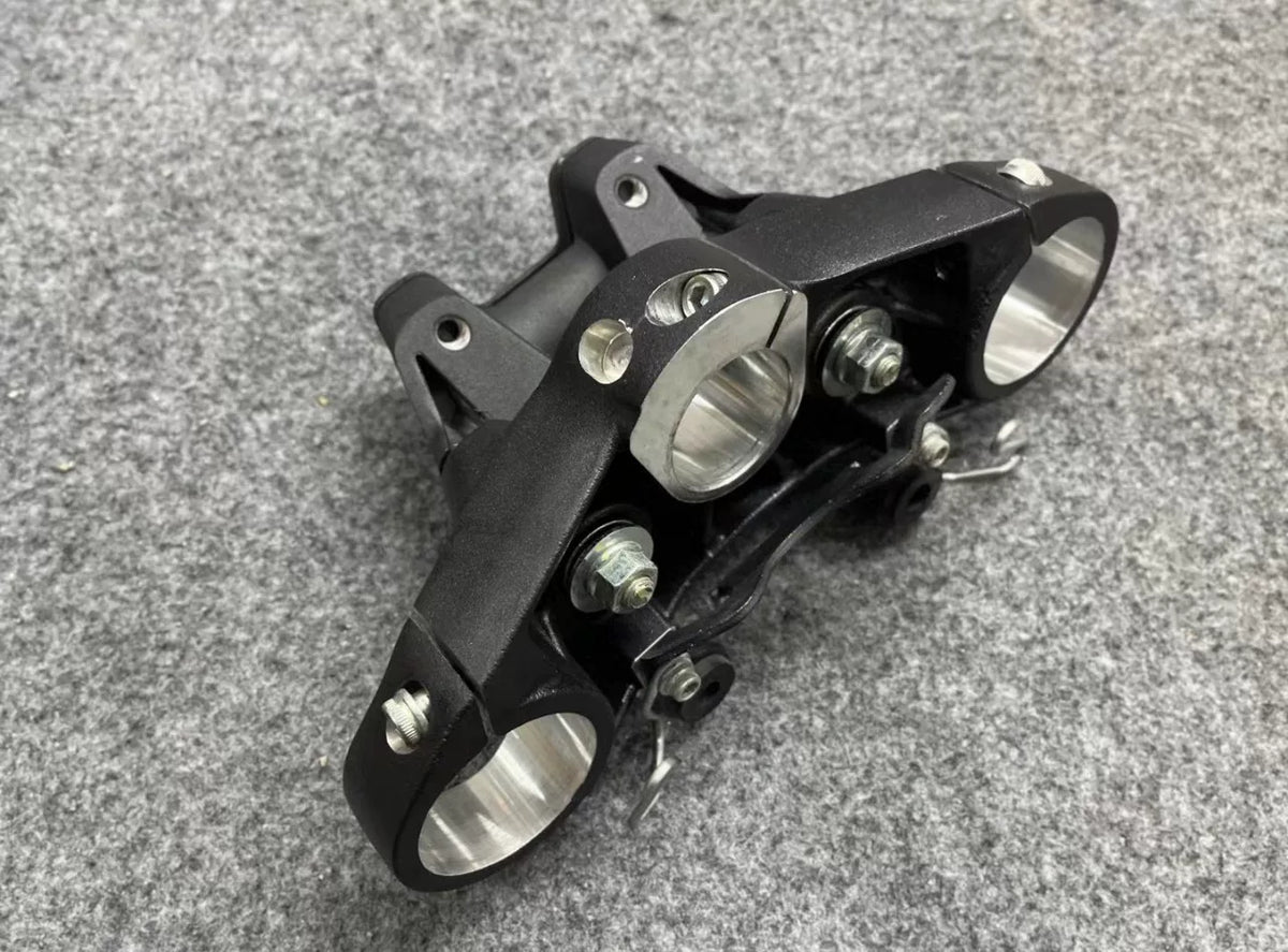 Ducati Monster 821 upper triple tree clamp with handlebar bracket mounts, top-down detail view