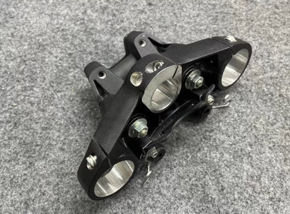 Ducati Monster 821 upper triple tree clamp with handlebar bracket mounts, top-down detail view