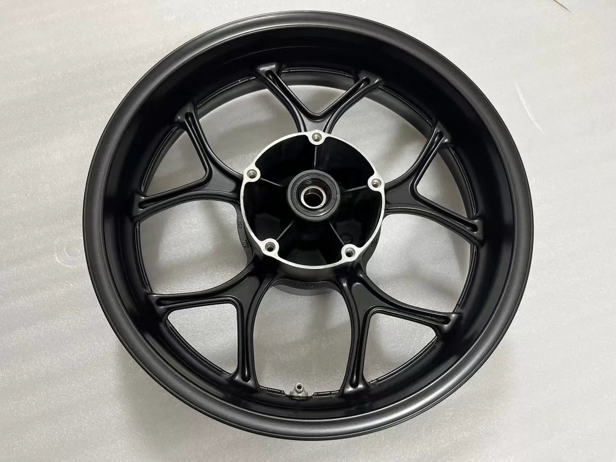 Honda NC750X rear rim side profile highlighting rim edge and spoke joints, silver alloy
