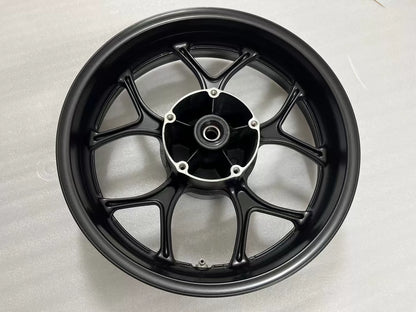 Honda NC750X rear rim side profile highlighting rim edge and spoke joints, silver alloy