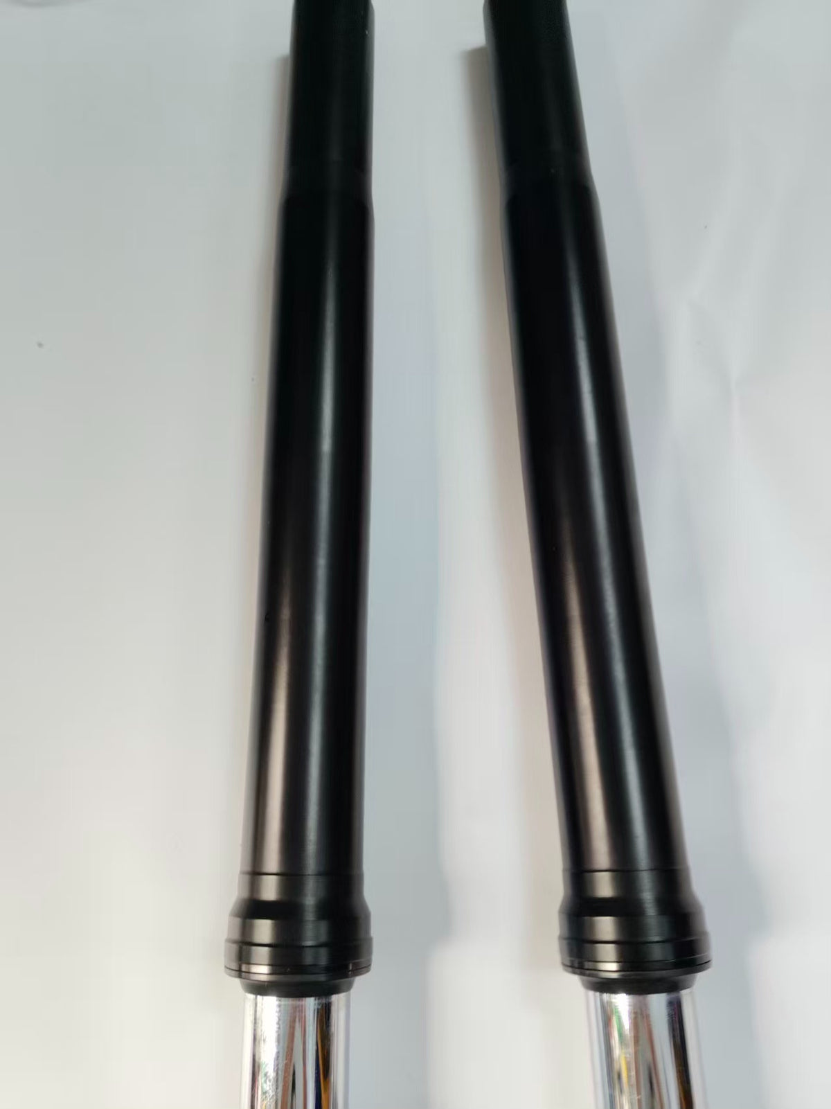 Right fork damper assembly black Versys 1000, detail shot of mid-section showing dust wiper and tube finish