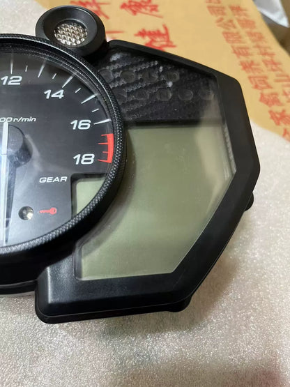 Yamaha YZF-R6 instrument cluster side profile view showing housing depth and bracket condition