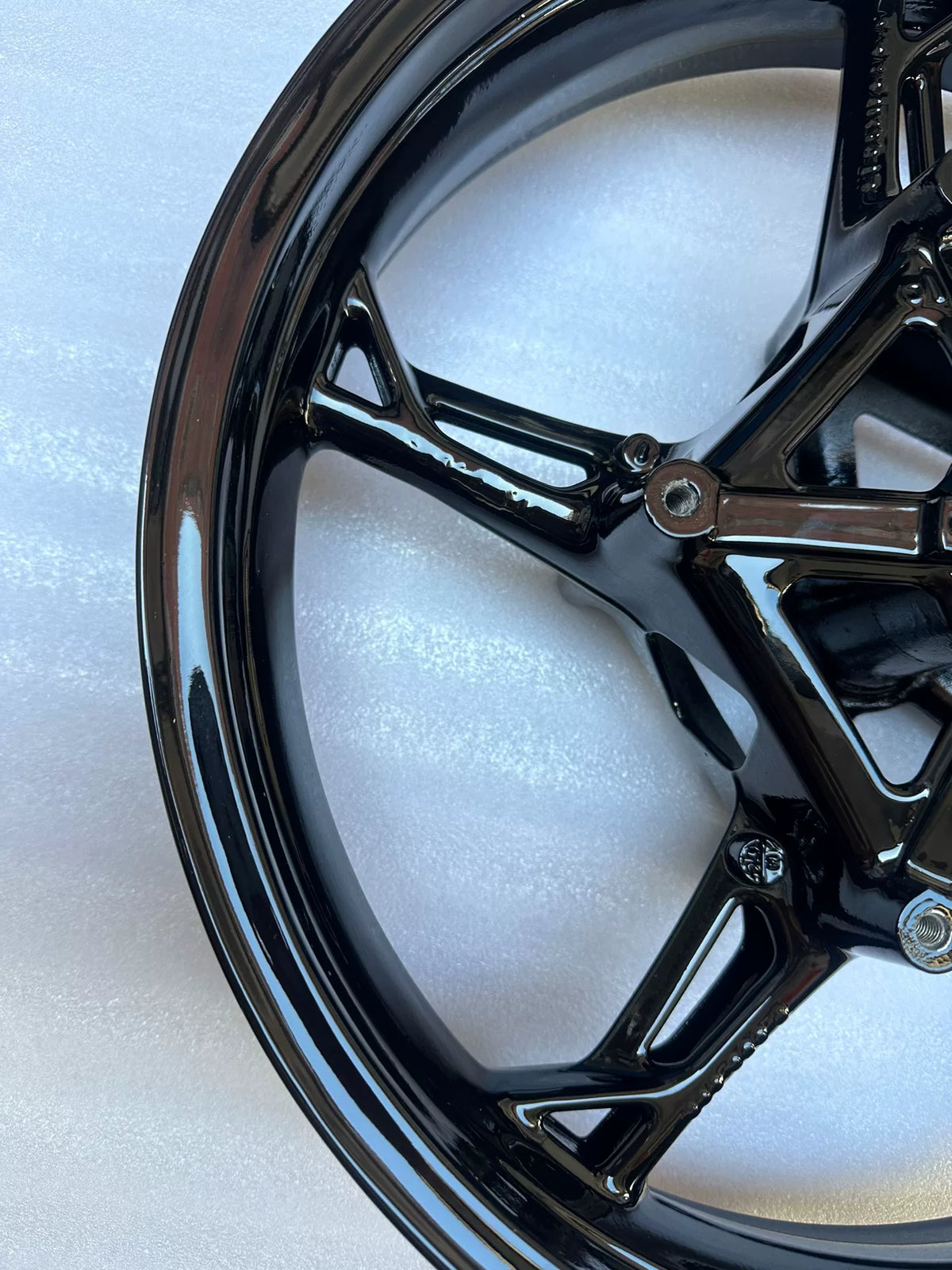 BMW S1000RR front wheel inner rim view with spoke roots and hub assembly visible