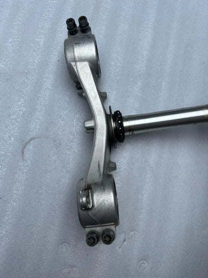 BMW S1000RR triple clamp side profile view highlighting stem length and overall clamp thickness