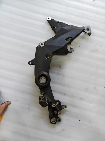 Ducati Multistrada 1200 footpeg bracket, top-down view revealing full bracket layout and bolt holes