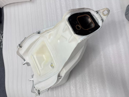 White Ducati Panigale V2 tank right-side profile view displaying overall shape and glossy white finish