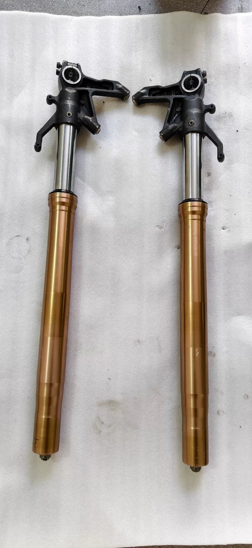 Kawasaki ZX-10R front fork pair side angle view showing full assembly length and condition