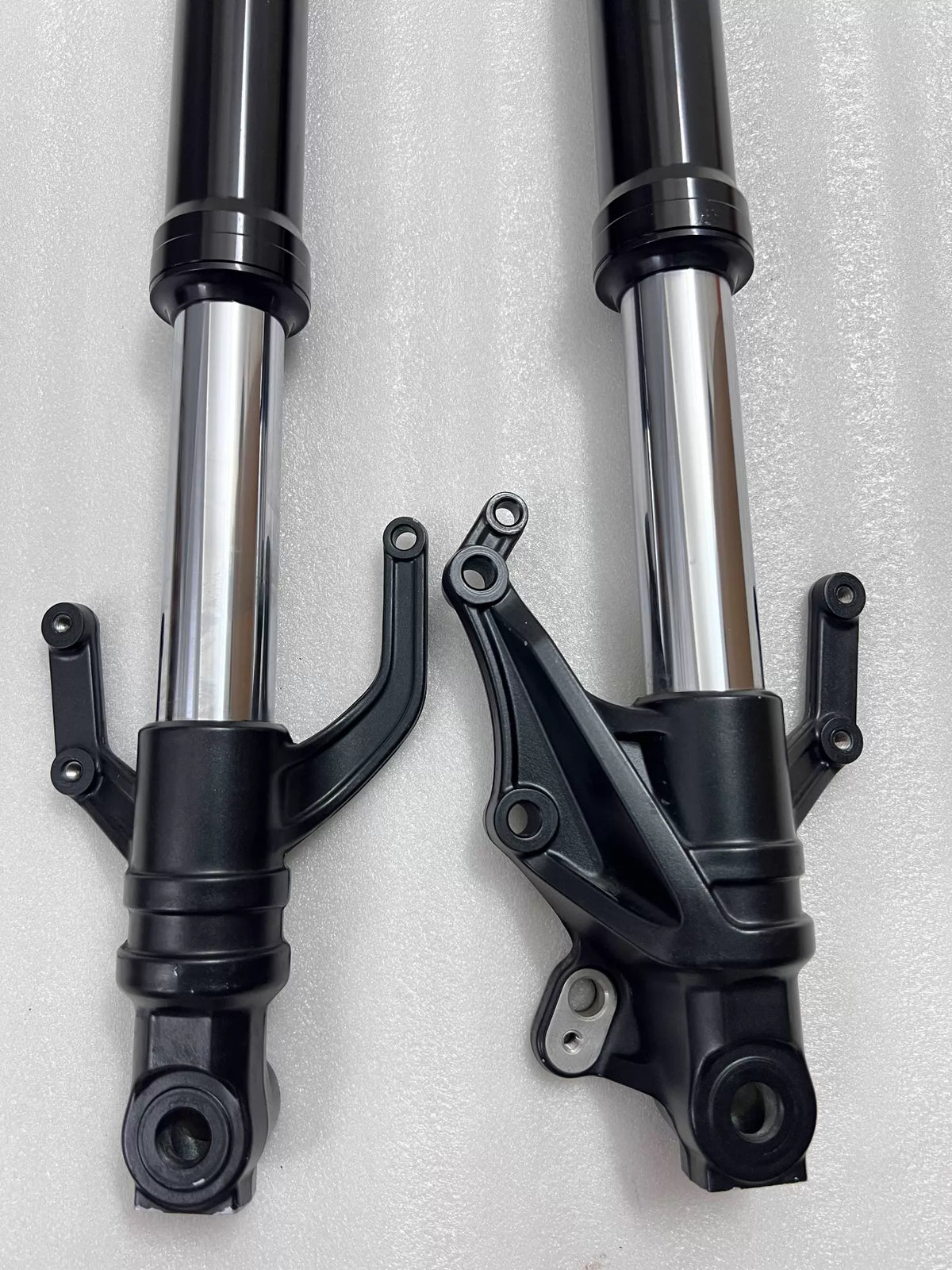 Yamaha YZF-R3 front fork assembly, close-up of upper tube and cap detail