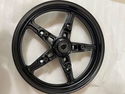 BMW R nineT cast rear rim, inner spoke surface detail showing casting texture and finish