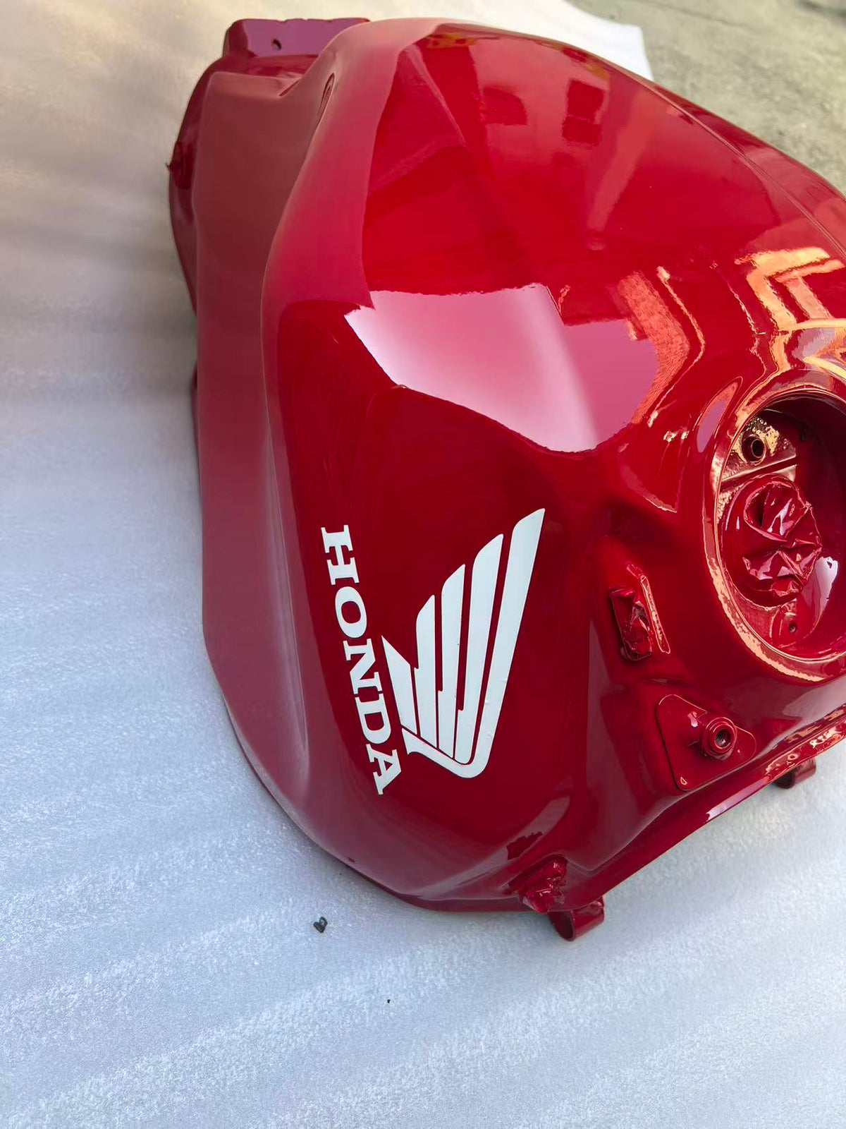 Honda CBR 650R 2019-2025 fuel tank, underside view showing brackets and fittings