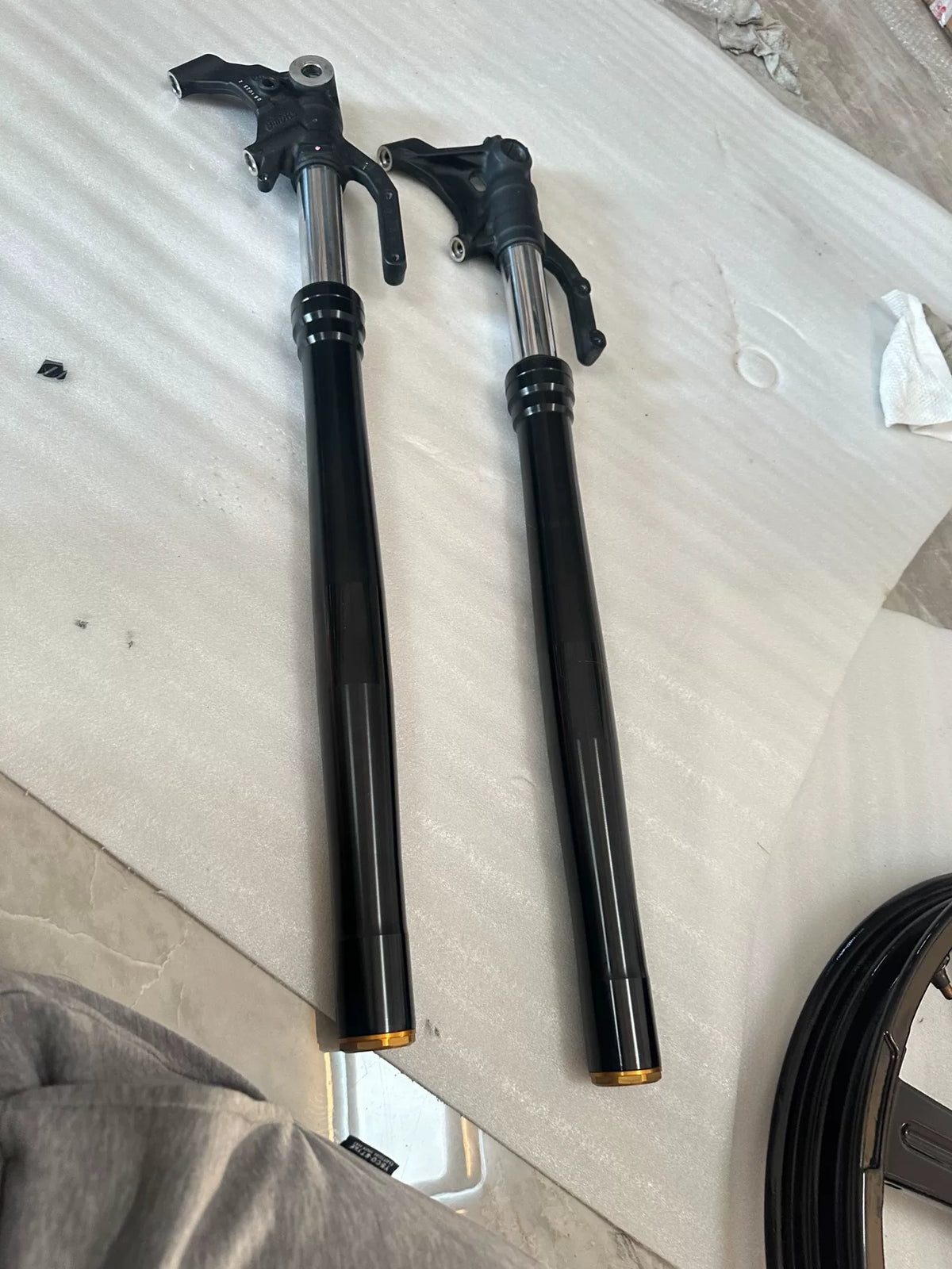 Right-hand fork damper assembly for Kawasaki ZX-4RR, angled view showing full chrome stanchion tube and internals