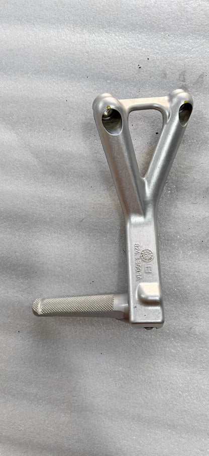 Ducati Panigale V4 footpeg bracket pair laid flat, full overview of both left and right anodized billet components