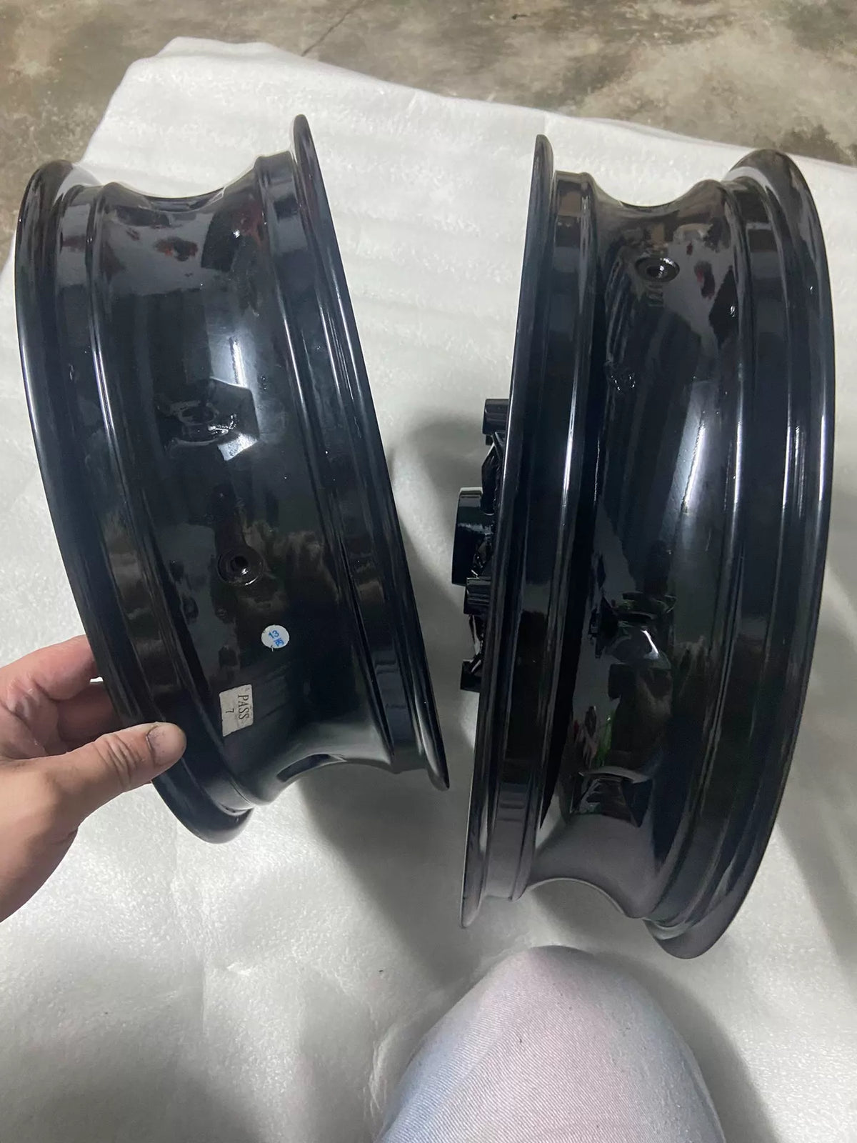BMW C400X rear wheel rim, close-up of hub bearing housing and axle bore from rear angle