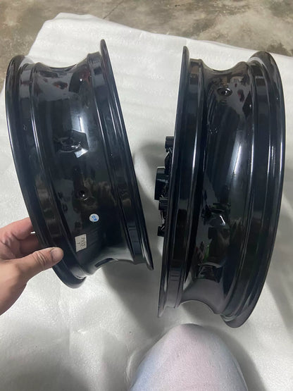 BMW C400X rear wheel rim, close-up of hub bearing housing and axle bore from rear angle
