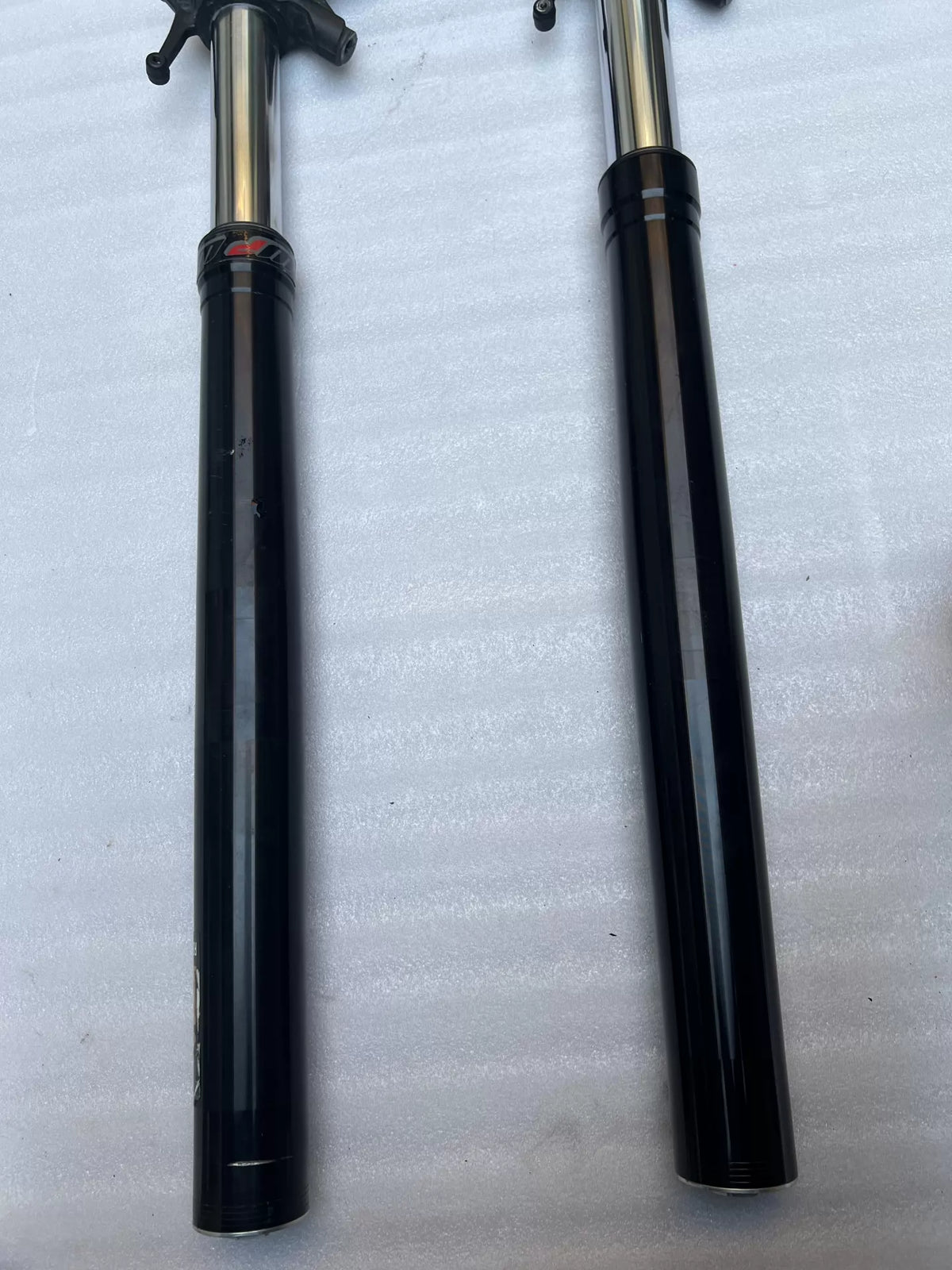KTM 790 Duke front fork straight tube, close-up of lower end showing bore and edge finish