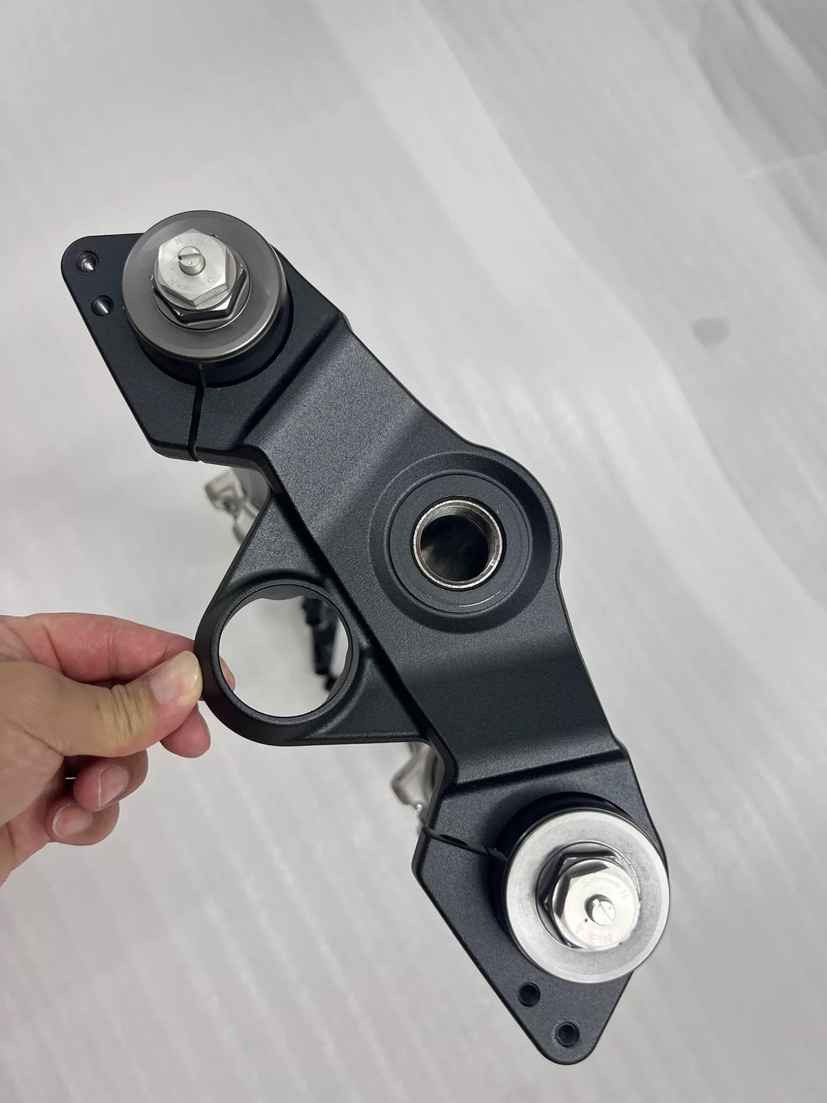 Front fork assembly laid flat showing full length of tubes and clamps, Ninja 1000SX