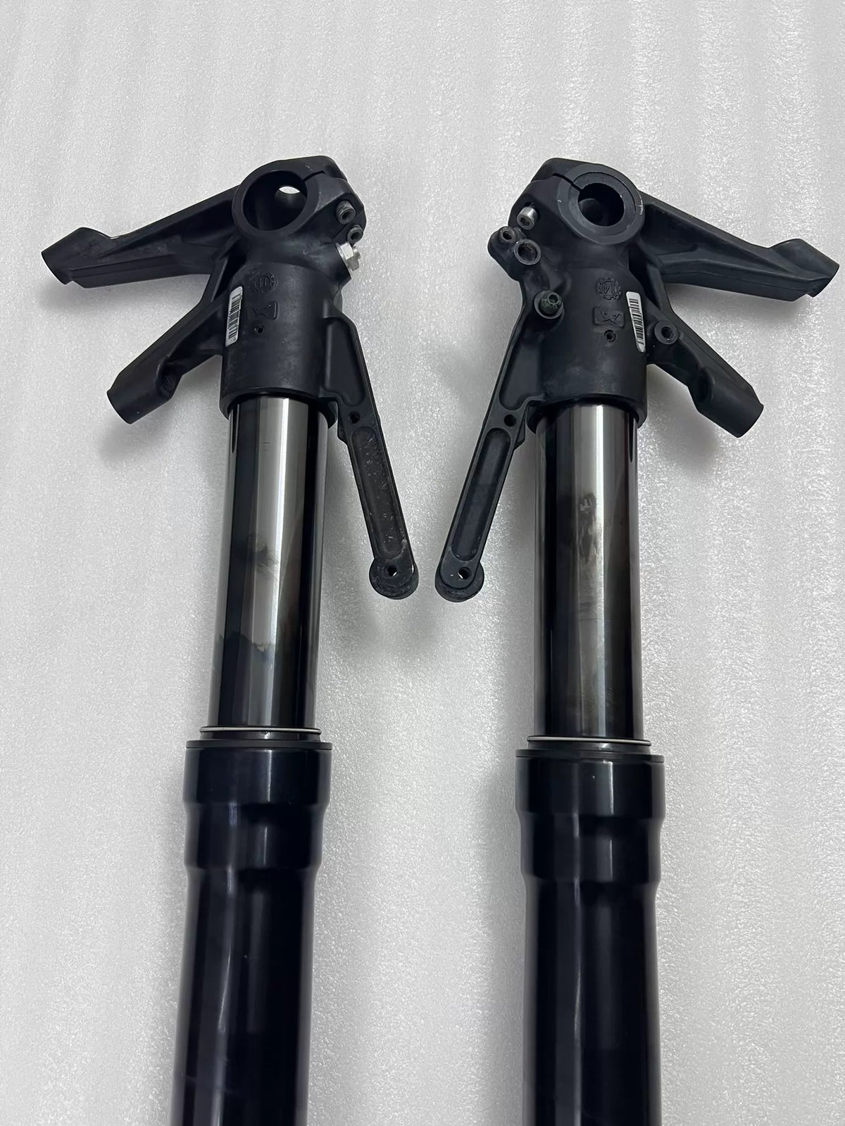 Ducati Diavel 1200 front fork lower leg bottom, axle pinch bolt and dust seal area close-up