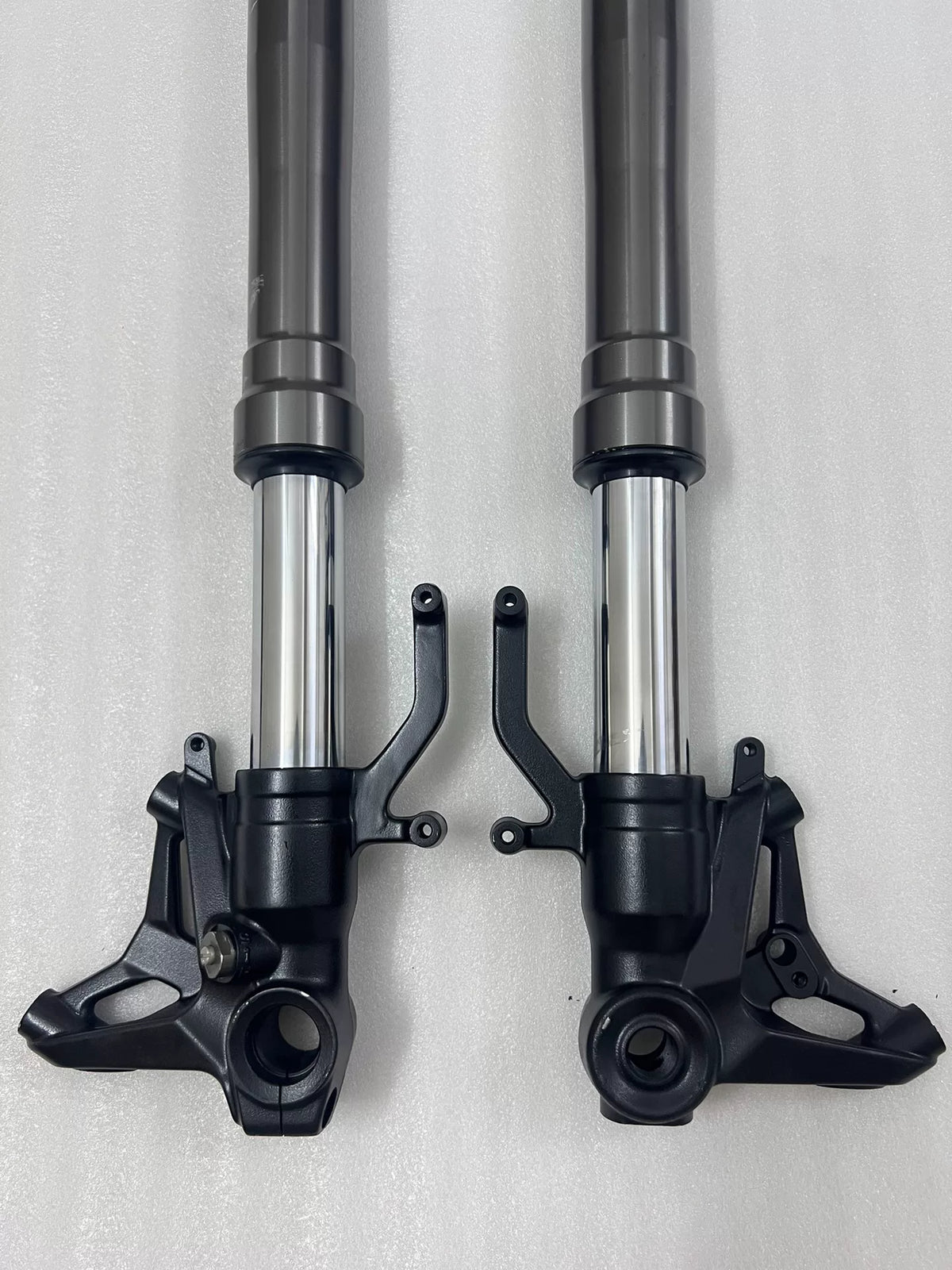 Kawasaki Ninja 1000 SX fork assembly side profile highlighting triple clamp mount area and tube length