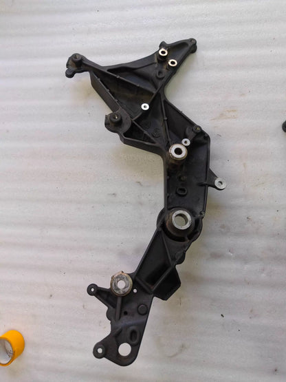 Ducati Multistrada 1200 footpeg bracket, underside view showing plate thickness and hardware detail