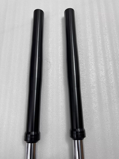 Yamaha YZF-R3 front fork assembly, lower leg close-up showing axle clamp and condition