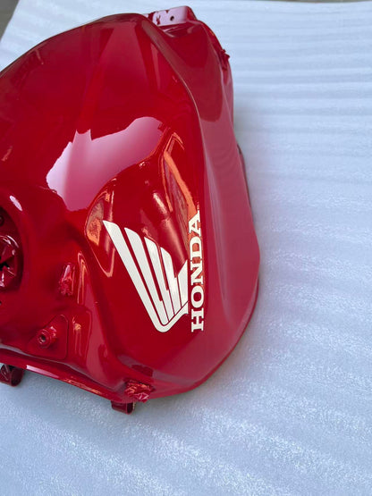 Honda CBR 650R 2019-2025 fuel tank, close-up of mounting tab and hardware detail
