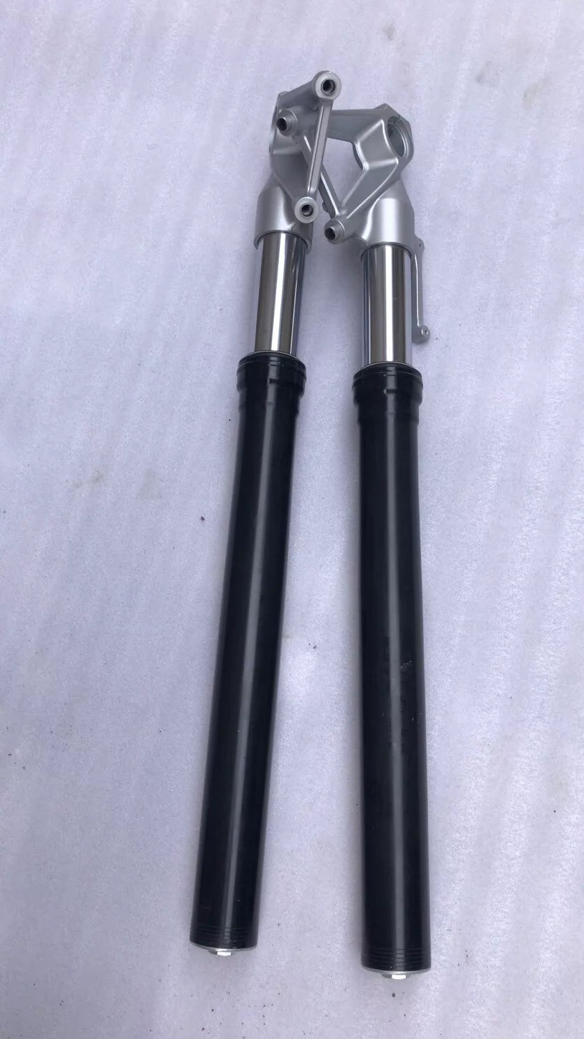 BMW S1000R fork leg upper tube close-up showing clean chrome finish and top cap detail