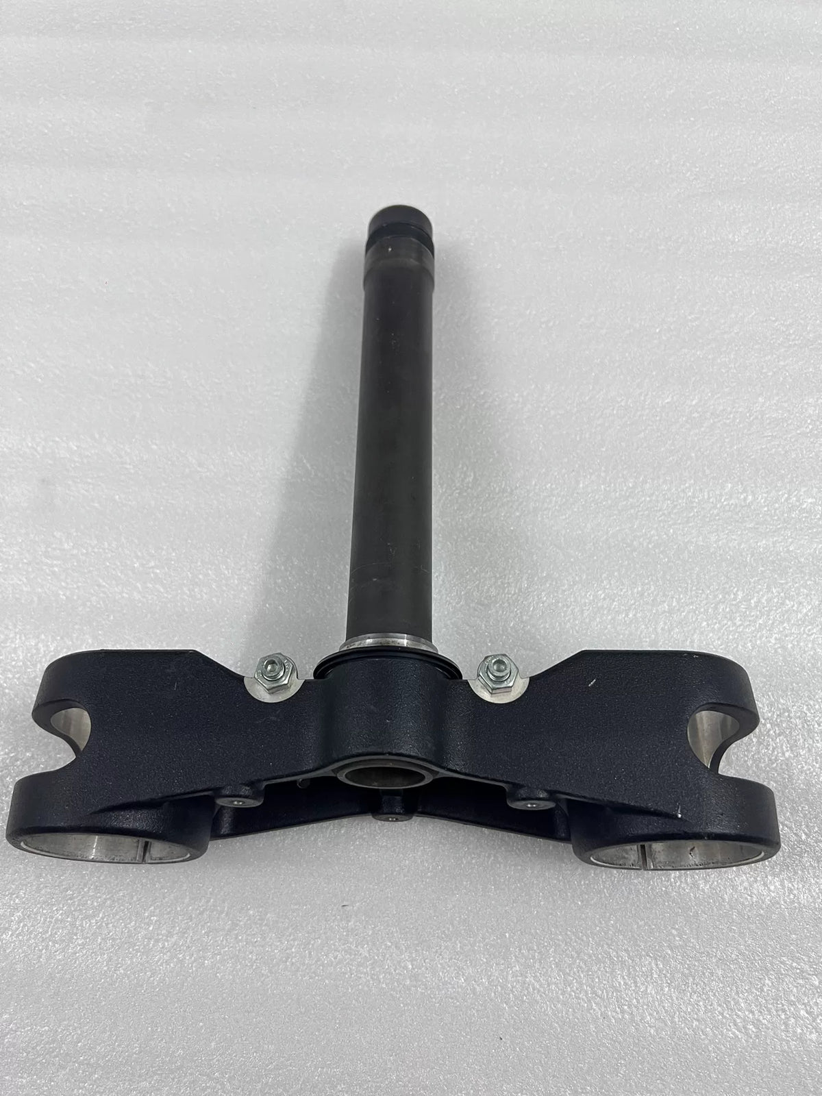 Lower fork yoke Ducati Multistrada 1200, underside view revealing axle clamp and casting details