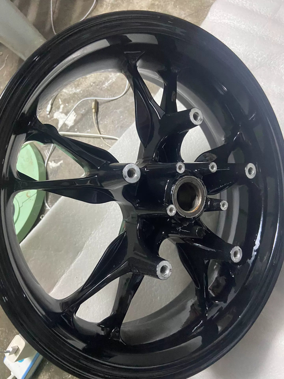 BMW C400X rear wheel rim, full face view displaying 5-spoke cast design and brake disc mounts