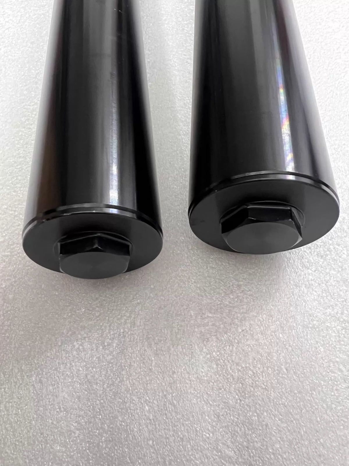 Yamaha YZF-R3 front fork assembly, angled view of both fork legs showing overall length