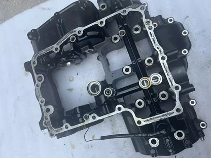 Lower crankcase Kawasaki Z900, side profile view showing bearing tunnel and gasket surface, used engine case
