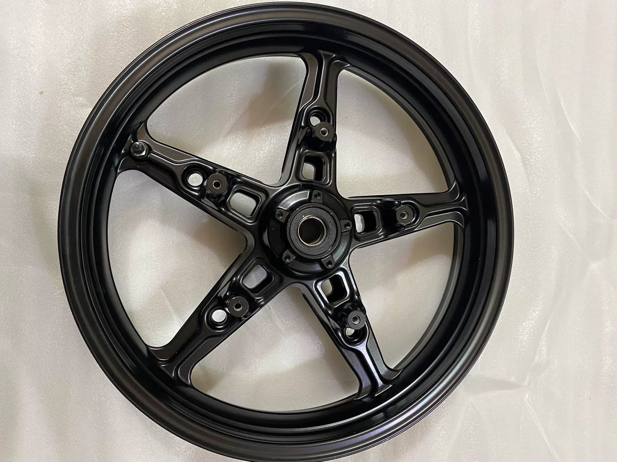 BMW R nineT cast rim close-up, hub center with precision machined mounting surface shown