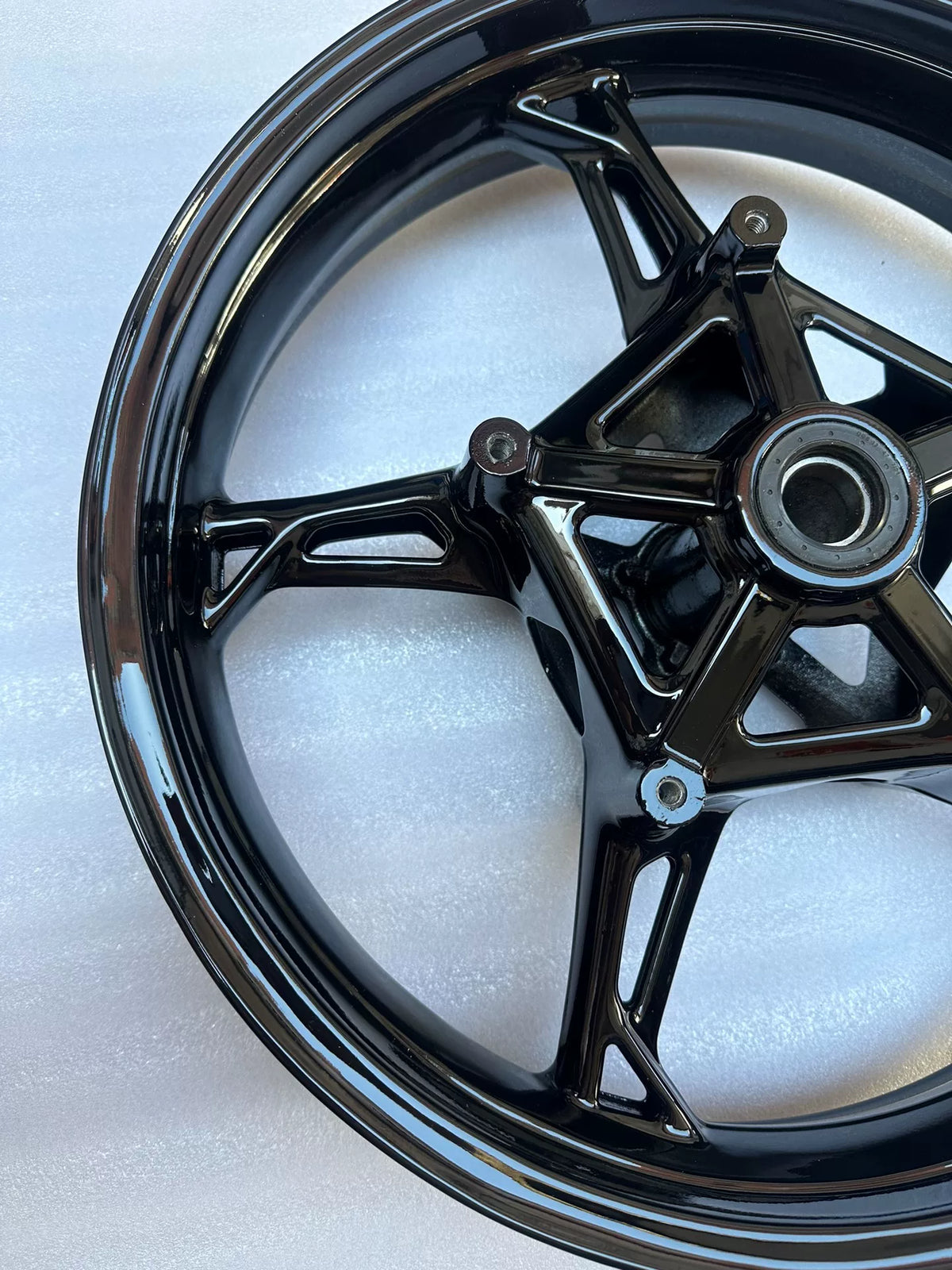 BMW S1000RR front wheel top-down flat lay showing full diameter and tire bead seat